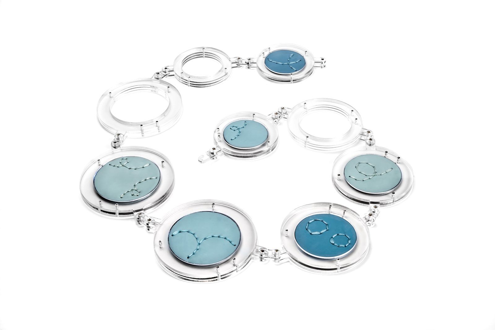 Necklace of clear acrylic links set with blue enamel discs